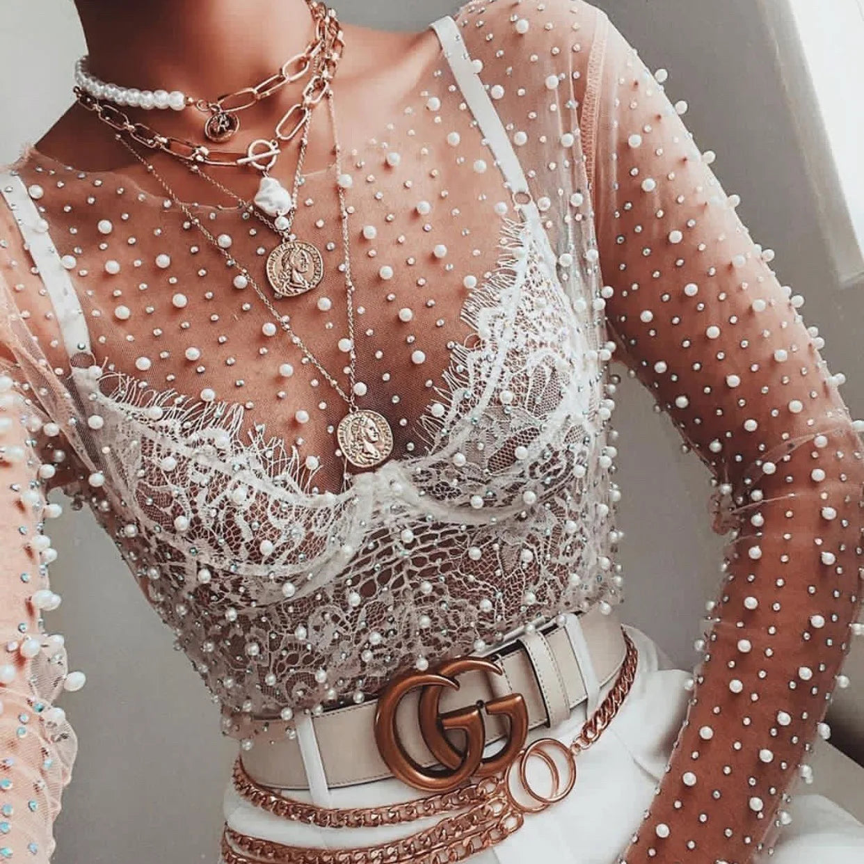 Luxe Mesh Diamond Top
Chic Sheer Pearl Crop Top